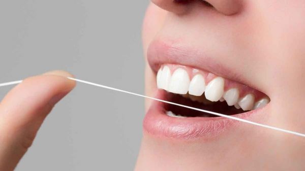 importancia de usar hilo dental
